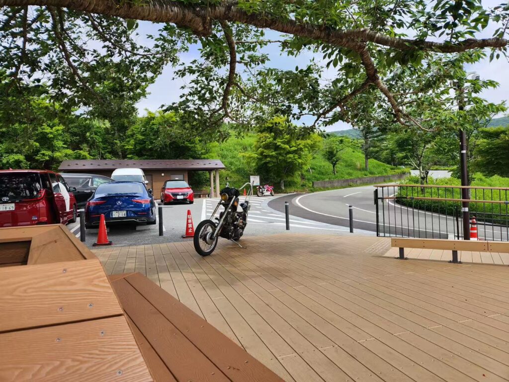 Motorcycle parked at Yamanaka-ko with Mount Fuji in background