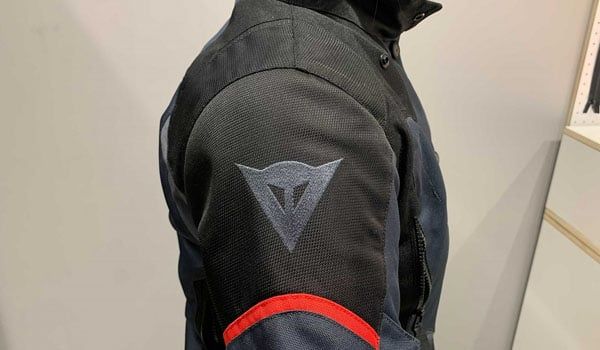 Motorcycle jacket fit for petite women: Dainese Tempest 3 D-Dry Ladies jacket shoulder armor placement on petite rider (source: blog.dainesejapan.com)